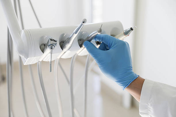 Professional Wisdom Tooth Removal technician working in Glenwood Landing, NY